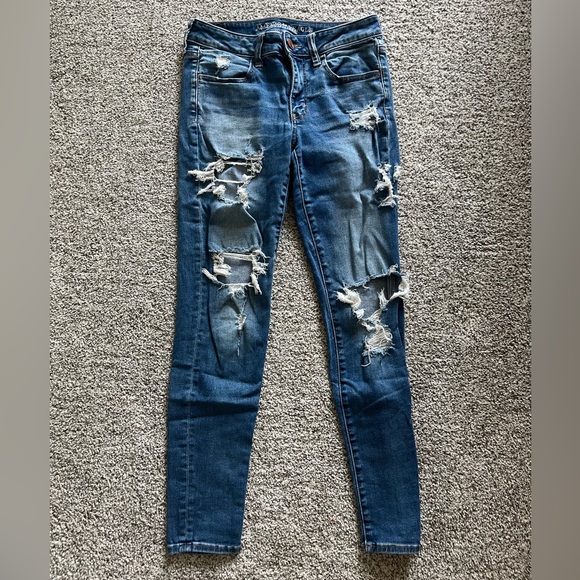 American Eagle Blue Ripped Jeans - Picture 1 of 3